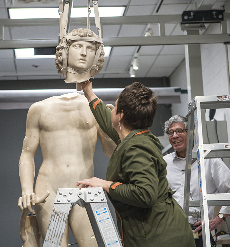 Carolyn Riccardelli, Met Museum Conservator, placing the head of Tullio Lombardo's Adam during restoration of the damaged example of monumental Renaissance sculpture